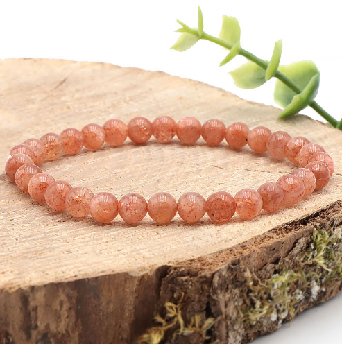 bracelet pierre de soleil qualité AA magnifique couleur orangé prononcé et très pure qui pétille intensément