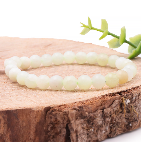 bracelet jade de chine 06mm qualité A pierre naturelle jaune pale avec une légère transparence