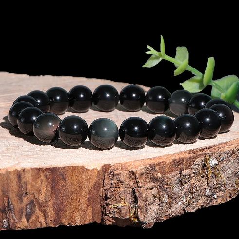 bracelet obsidienne oeil céleste pierre naturelle noire au reflet irisé multicolore en forme d'oeil
