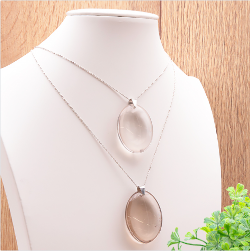 pendentif cristal fumé AA pierre naturelle des États unis transparent avec un léger fumage à l'intérieur