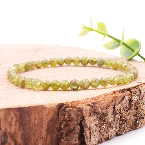 bracelet péridot 06mm pierre naturelle qualité A+ avec une belle couleur verte et belle transparence avec légère inclusion