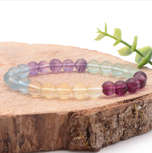 bracelet fluorine multicolore triée AA+ 08MM pierre naturelle avec perle violette, verte, bleue, jaune, et rainbow aussi dénommé arc en ciel. Un bracelet magnifique et très pure au couleur de la fluorine